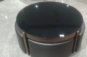 coffe table with four ottomans inside