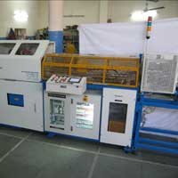 Tube cutting machine